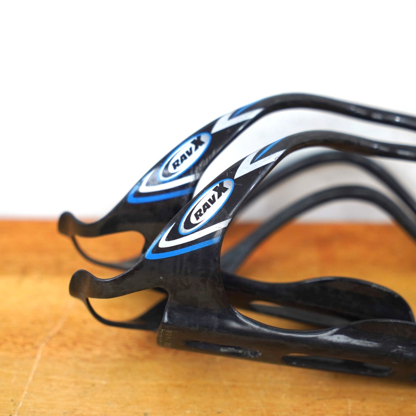 RavX Gamma Glossy Black and Blue Carbon Water Bottle Cages (Set of 2)